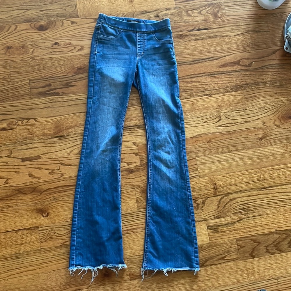 Brand is CELLO, size small, and color is a normal jean blue.